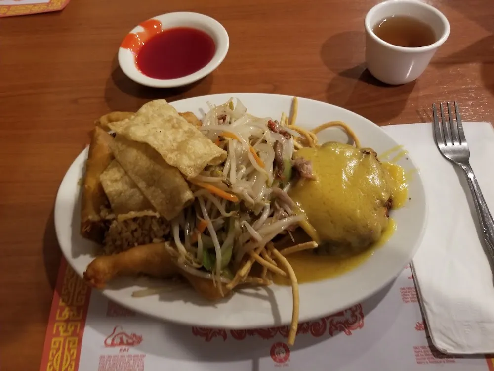 Chinese Combo Plate with Egg Foo Yung Prawns Crispy Noodle B RSS an Sprout Chow Mien Fried Wonton